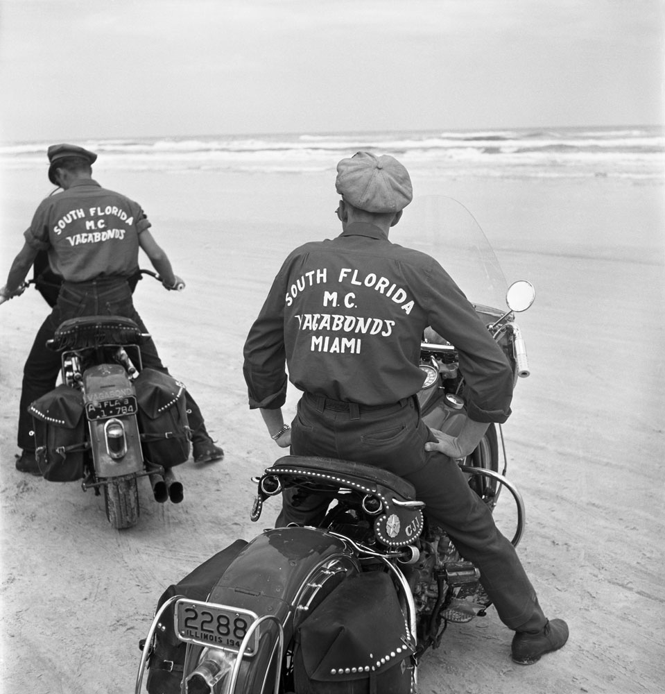 Photo taken from behind two South Florida MC members on their Harley-Davidson motorcycles at the 1948 Daytona 200