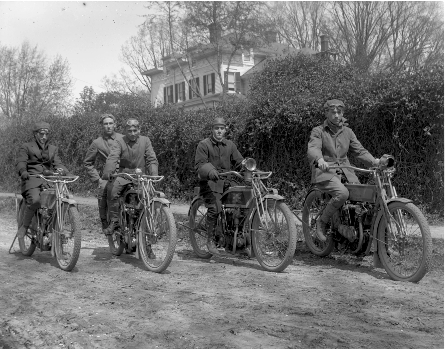 Motorcycle club circa 1912 on Excelsior and Harley-Davidson motorcycles